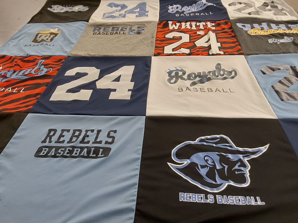 T-shirt quilt with sports, baseball themes by Darlene from CA