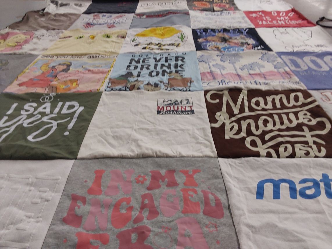T-shirt quilt with engagement, family themes by Bailey from TX