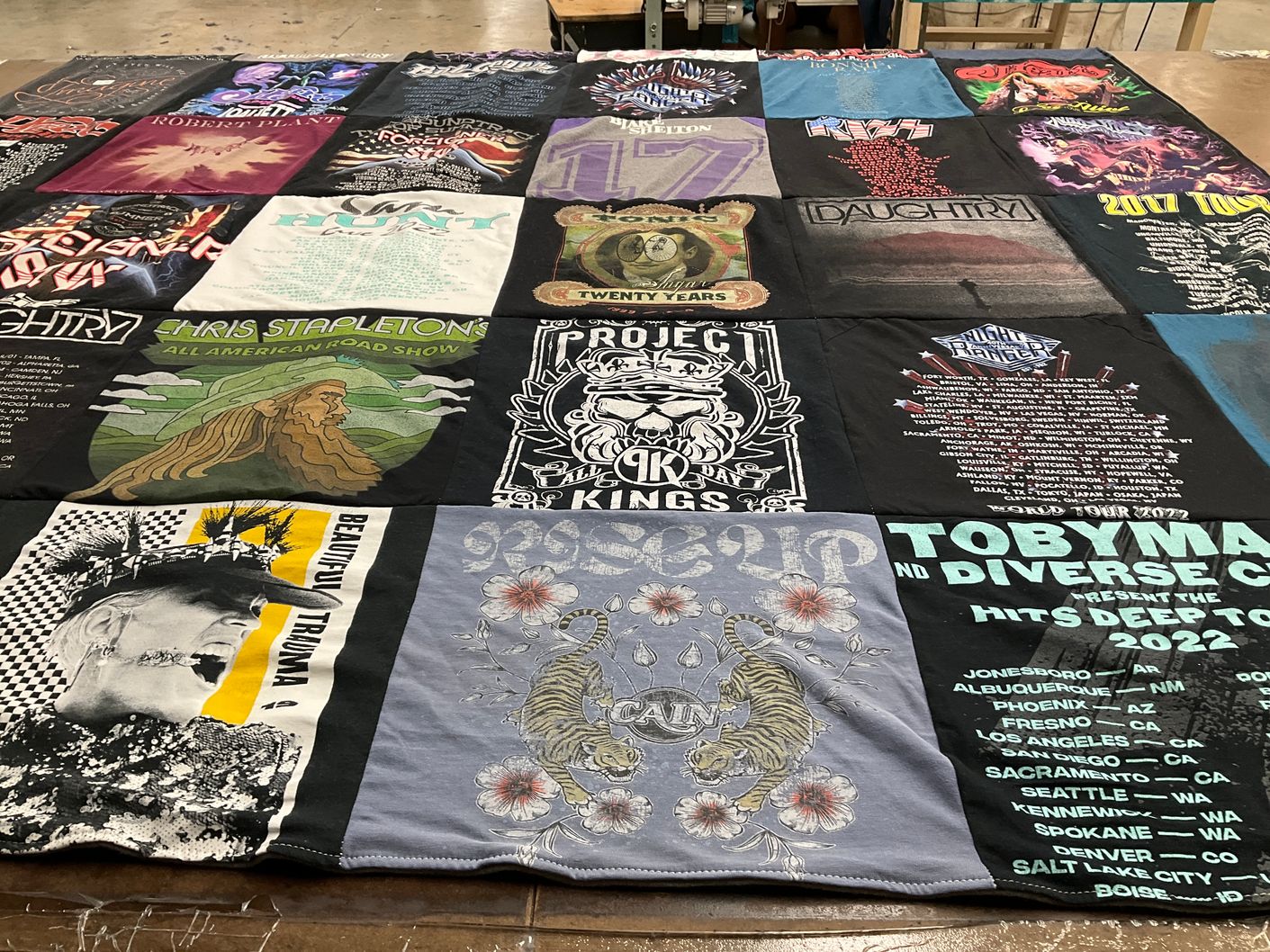 T-shirt quilt with music, concerts themes by christine from WA