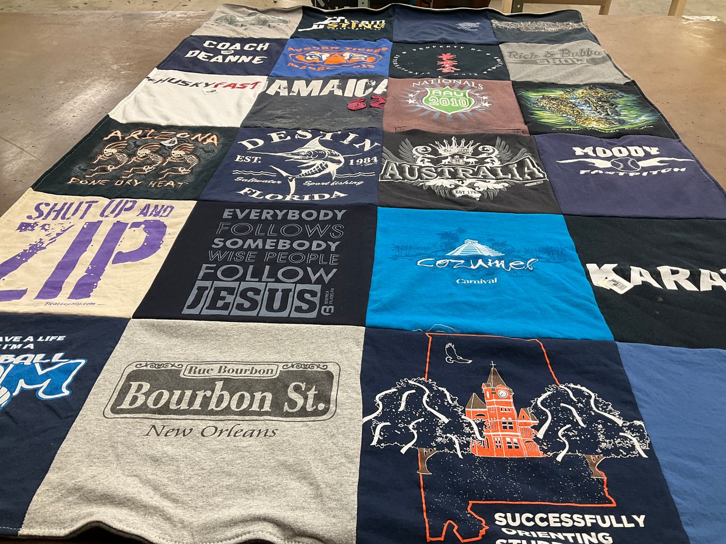 T-shirt quilt with travel, sports themes by Audrey from AL