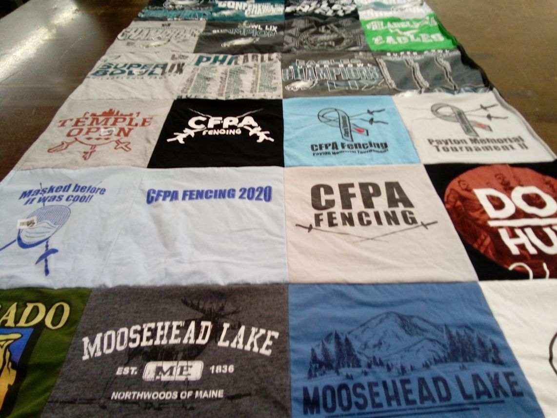 T-shirt quilt with fencing themes by Rebecca from NJ