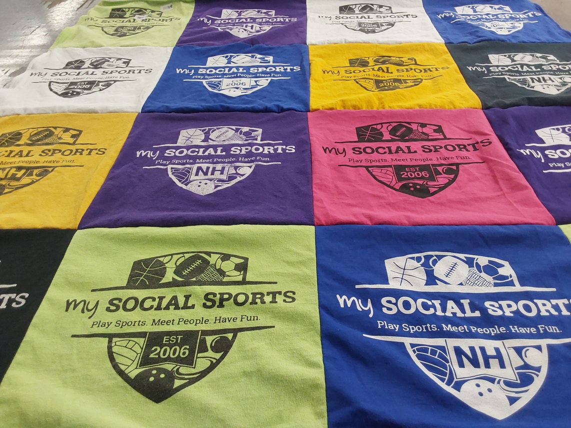 T-shirt quilt with sports, social activities themes by Margo from NH