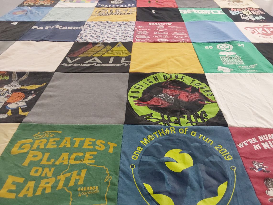 T-shirt quilt with basketball, marine biology themes by Lindsay from WI