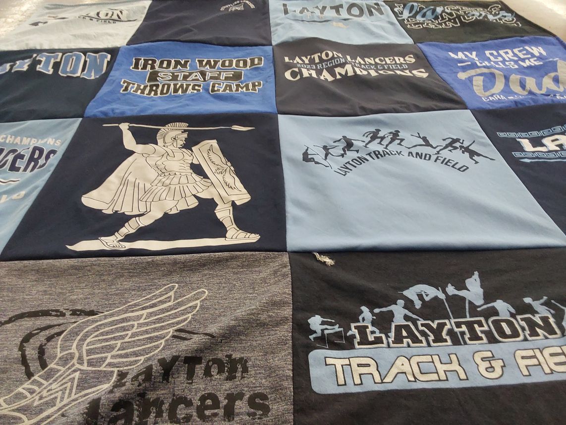 T-shirt quilt featuring layton lancers, layton track and field by lucie from UT