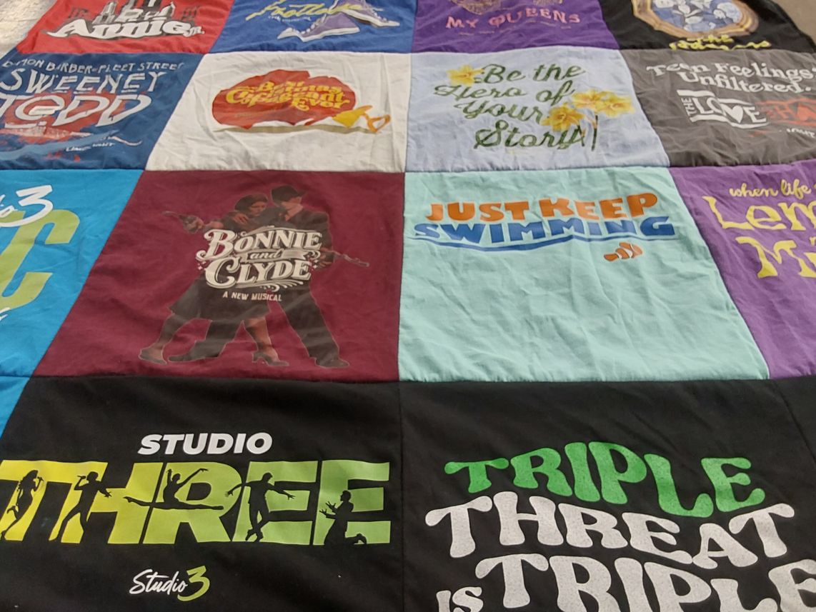 T-shirt quilt with theater, musicals themes by Amy from AZ