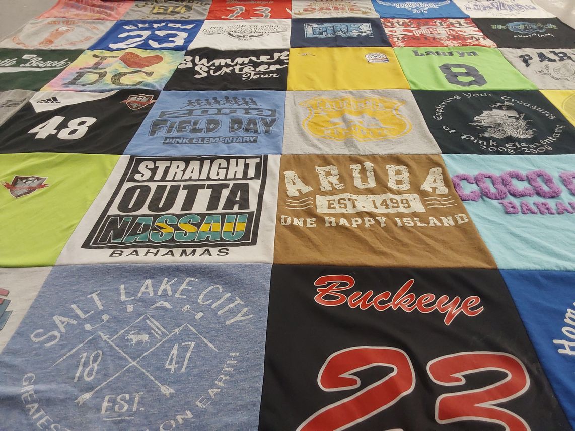 T-shirt quilt with travel, education themes by Lauryn from OH