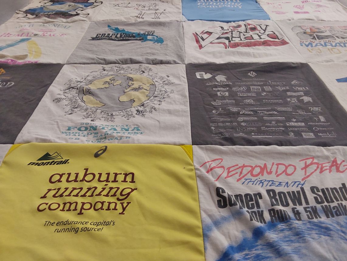 T-shirt quilt with running, fitness themes by Shari from TX