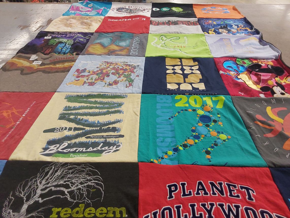 T-shirt quilt with running, animation themes by Suzanne from WI