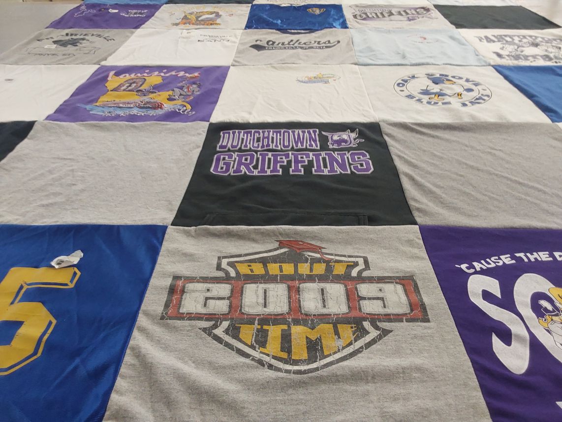 T-shirt quilt featuring dutchtown griffins, louisiana state university tigers by Sherri from LA