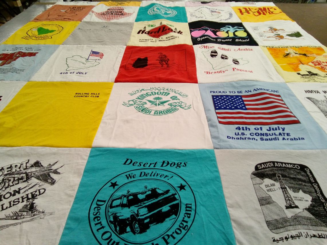 T-shirt quilt with military, international relations themes by Kathleen from NM