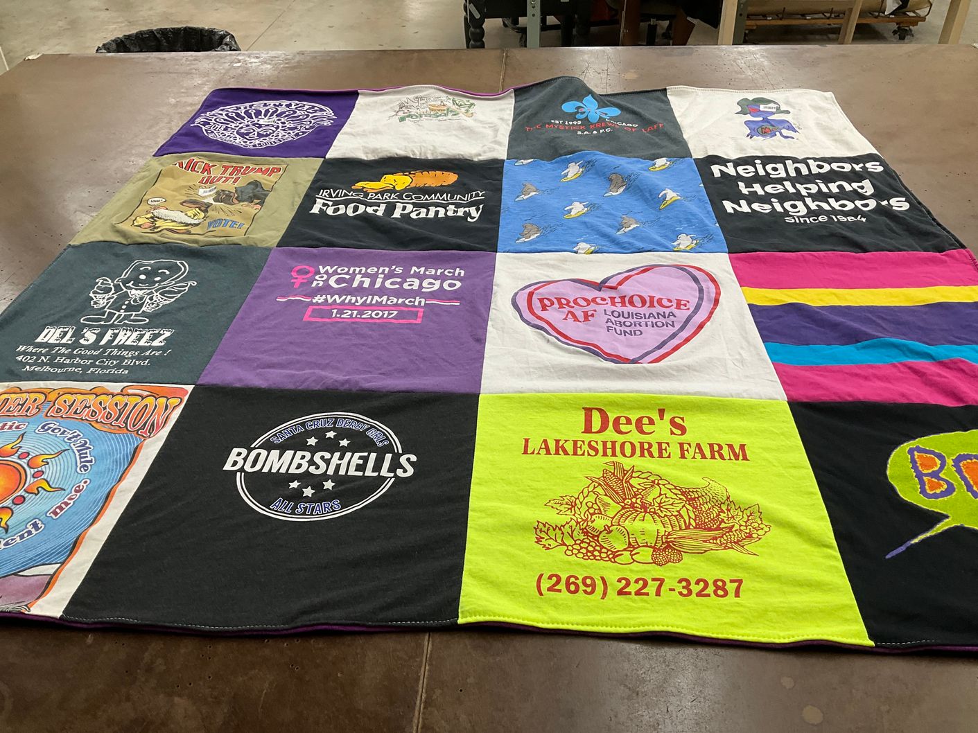 T-shirt quilt with social justice, community service themes by Fern from IL