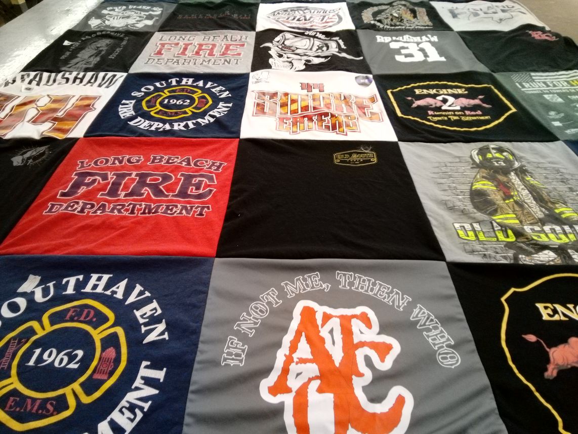 T-shirt quilt with firefighting, emergency services themes by Anna from TN