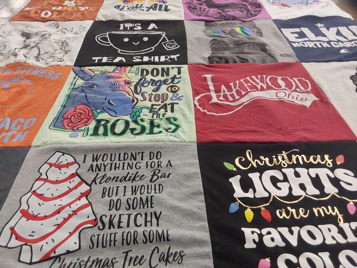 T-shirt quilt with fitness, tacos themes by Jamie from NC