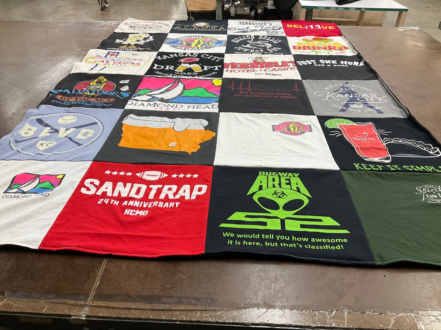 T-shirt quilt with local events, food and drink themes by Jenny from KS