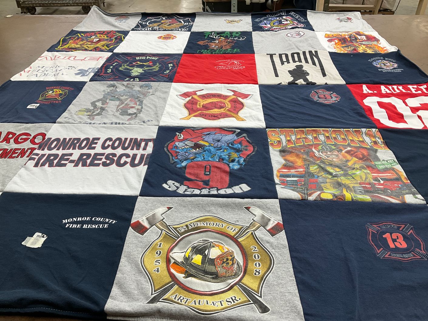 T-shirt quilt with firefighting, emergency services themes by Arturo from FL