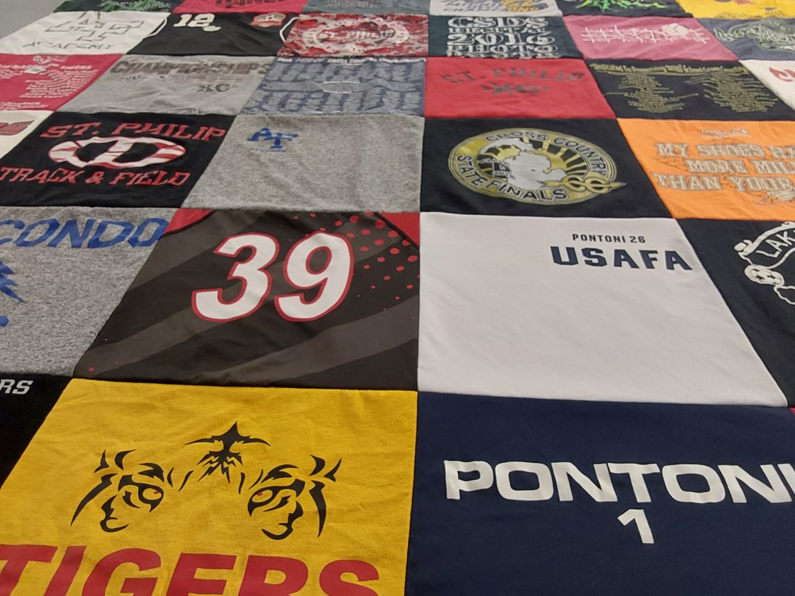 T-shirt quilt featuring st philip track and field by jennifer from MI