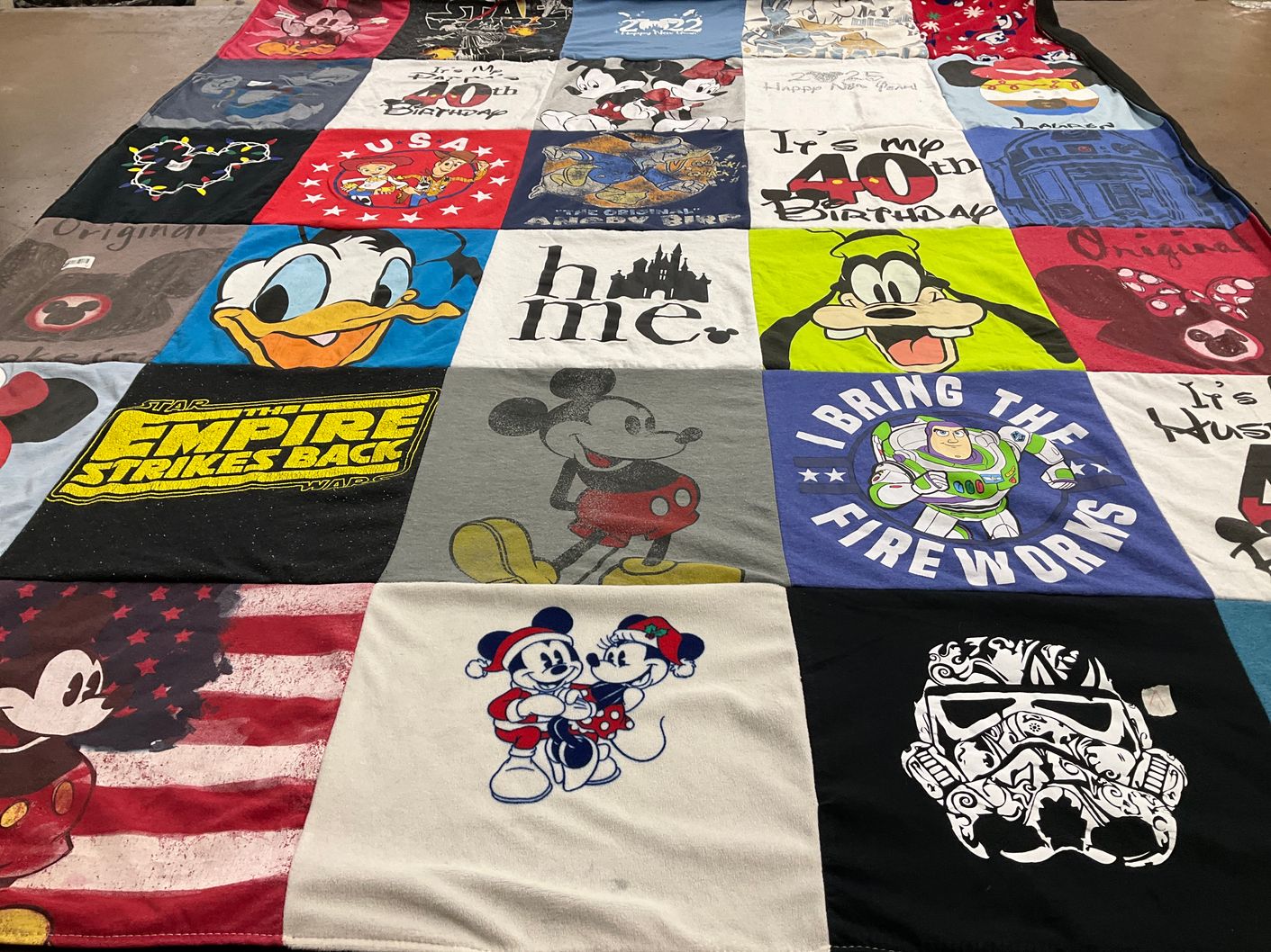T-shirt quilt with disney, star wars themes by Lauren from IL