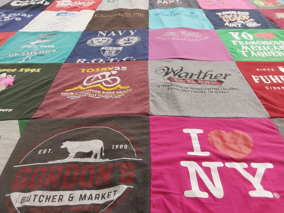 T-shirt quilt with cycling, food themes by Peter from PA
