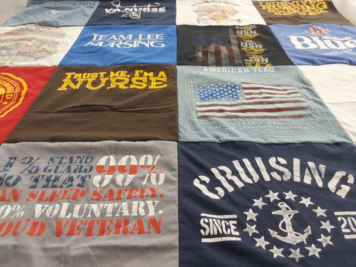 T-shirt quilt with nursing, military themes by Christine from MI