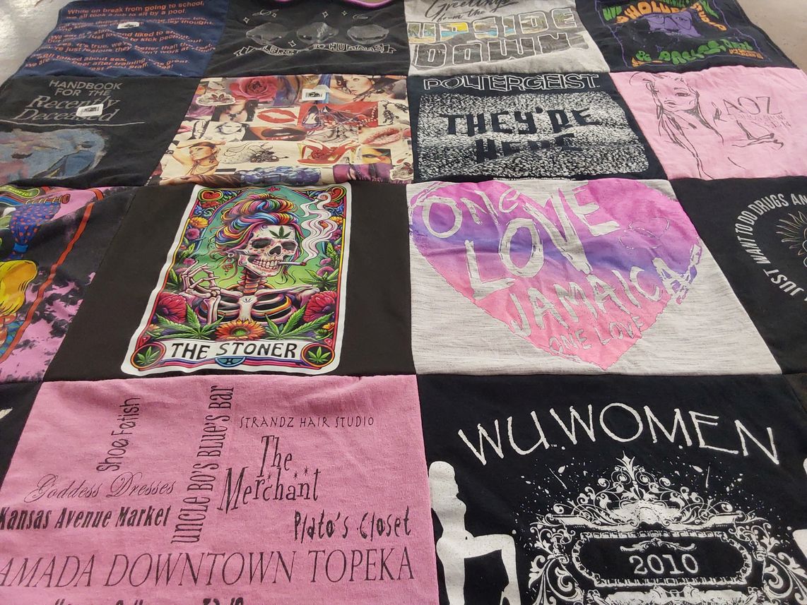 T-shirt quilt with art, music themes by Amber from TX