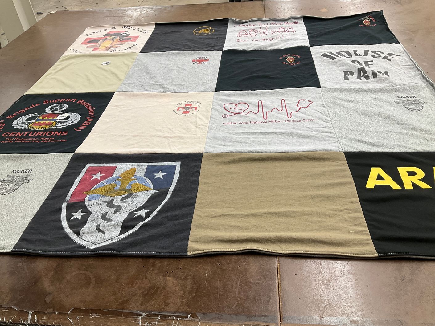 T-shirt quilt with military, healthcare themes by Jennifer from MD