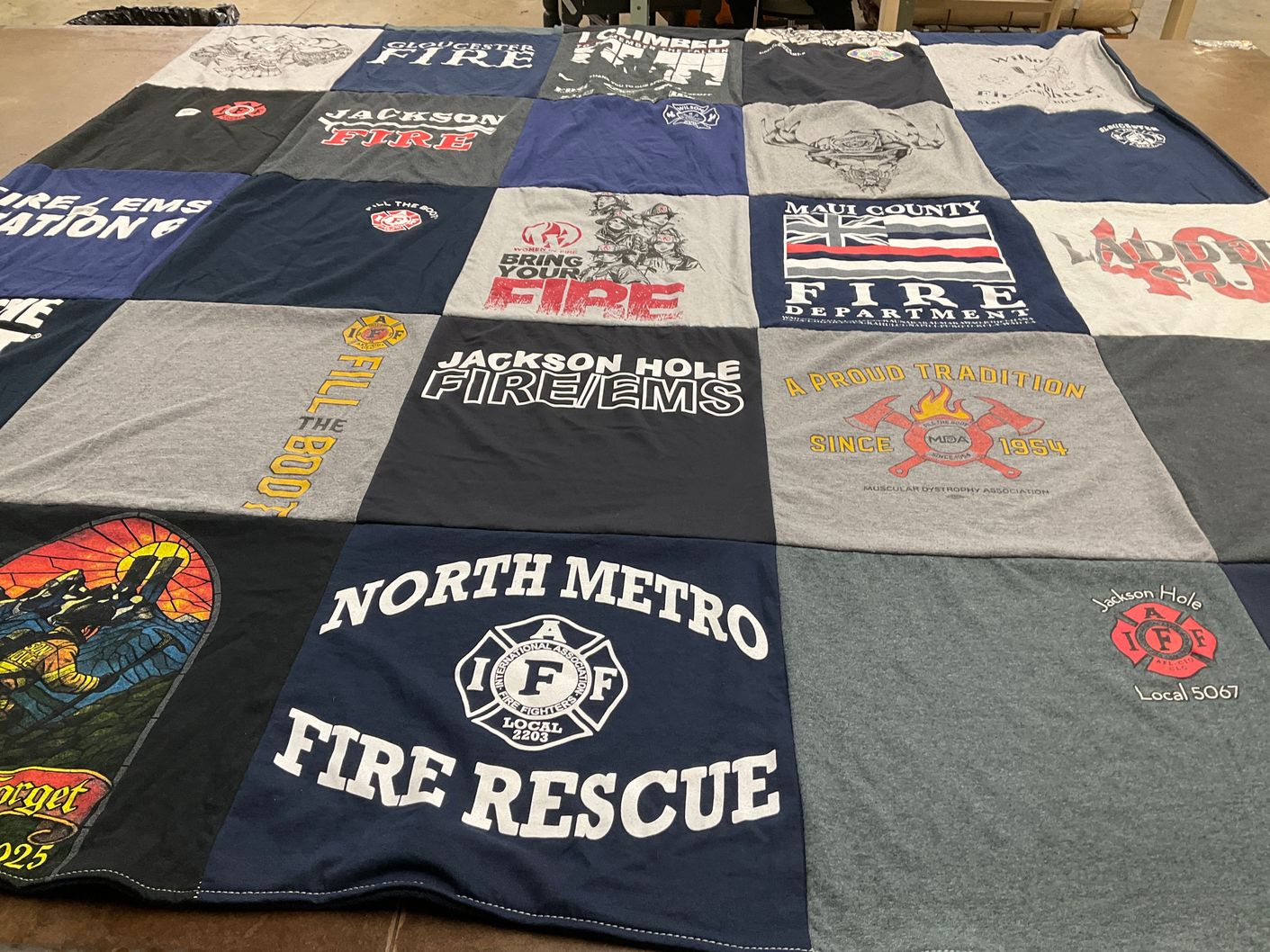 T-shirt quilt featuring jackson hole fireems by Caleigh from WY