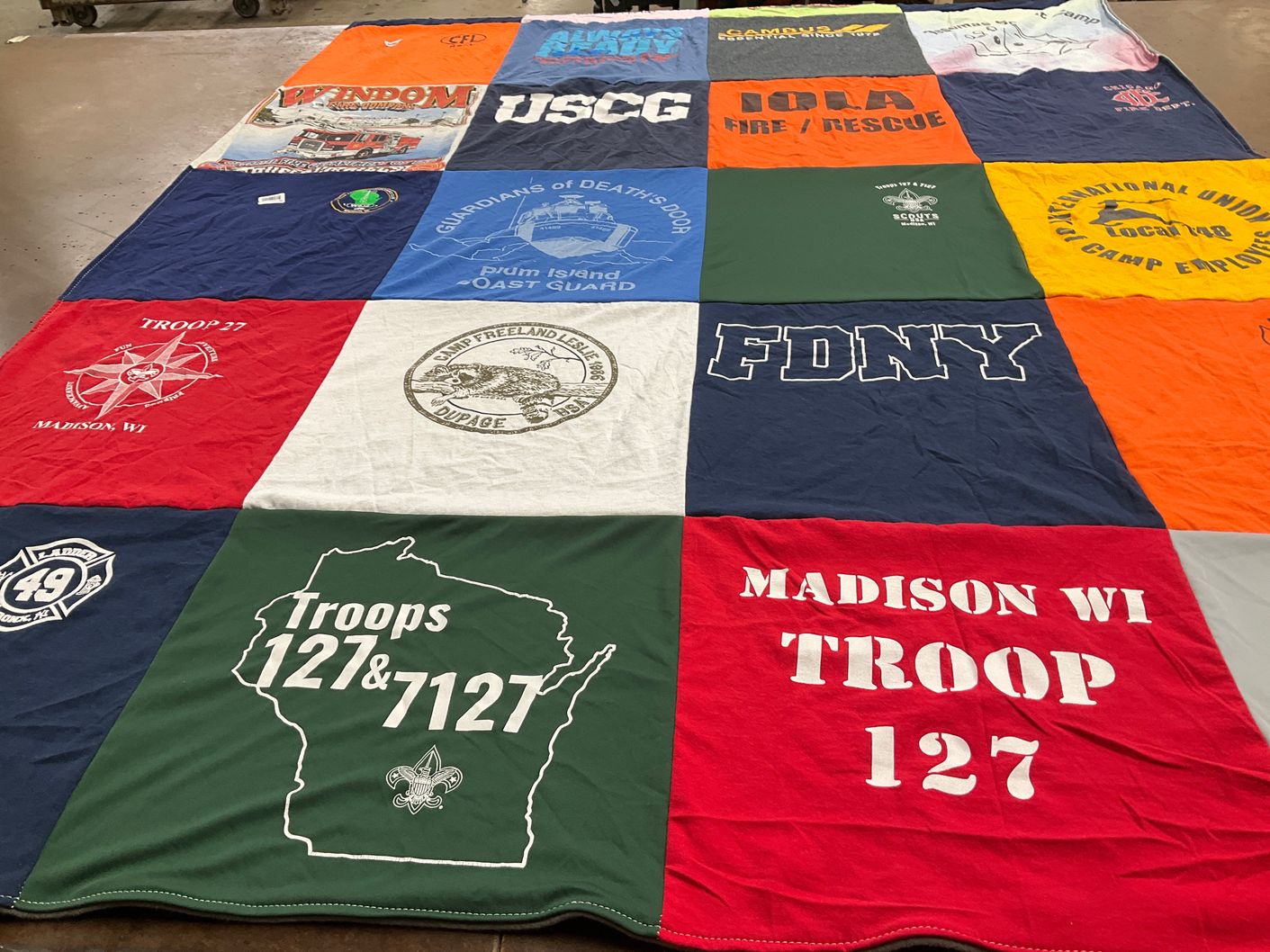 T-shirt quilt with scouting, firefighting themes by Paul from WI