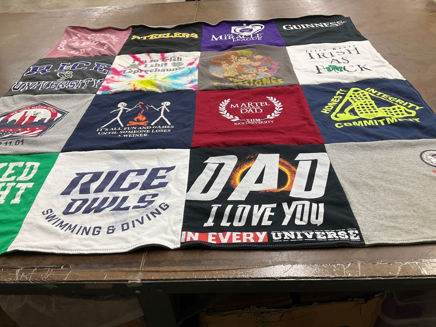 T-shirt quilt featuring rice owls swimming and diving by Rylee from NC