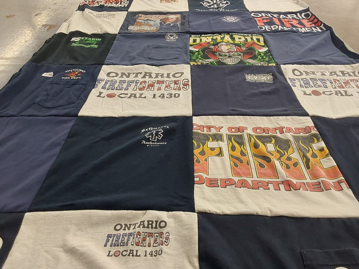 T-shirt quilt with firefighting, emergency services themes by MLiss from NC
