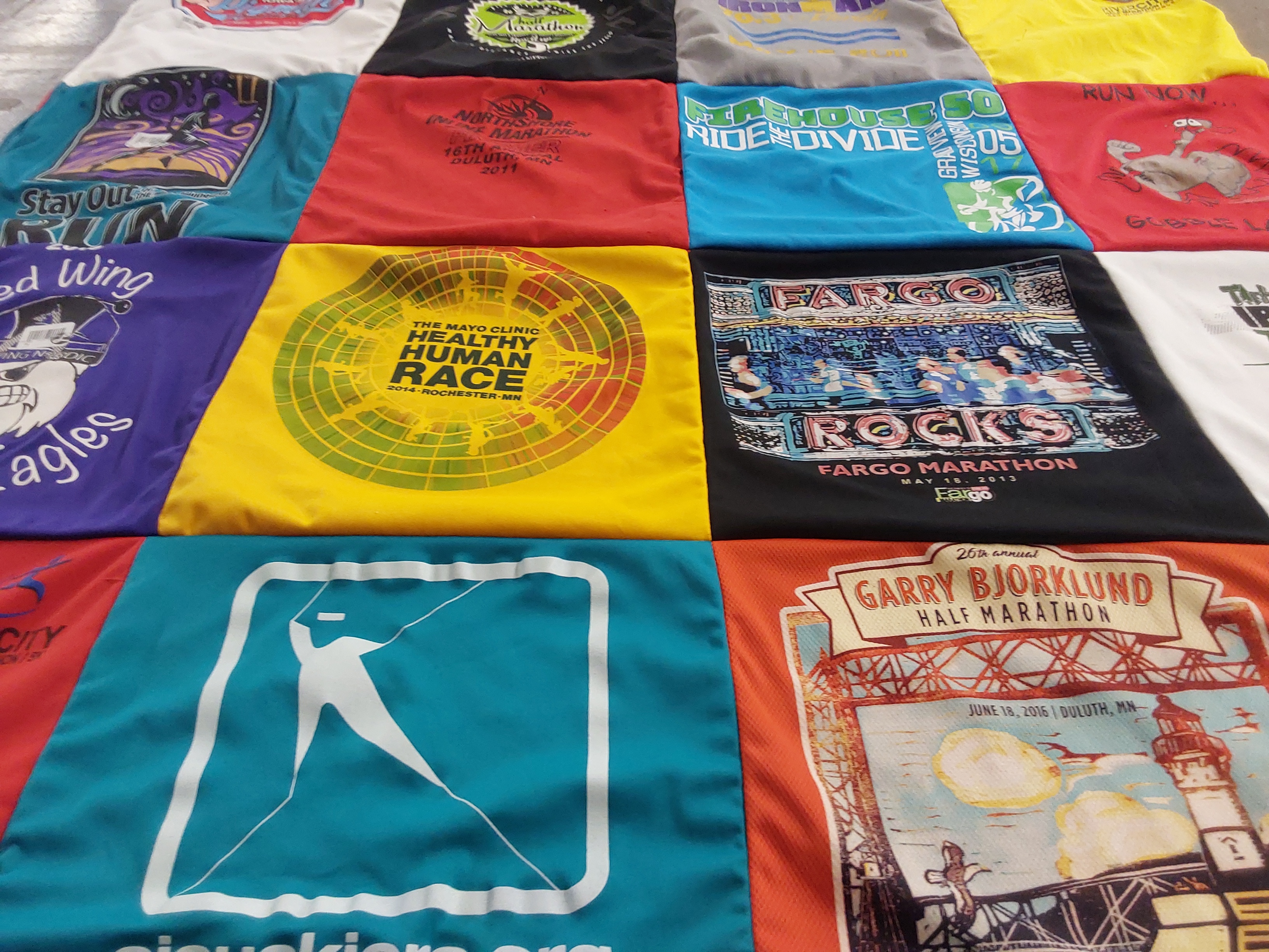 T-shirt quilt with skiing, running themes by Marceleen from MN