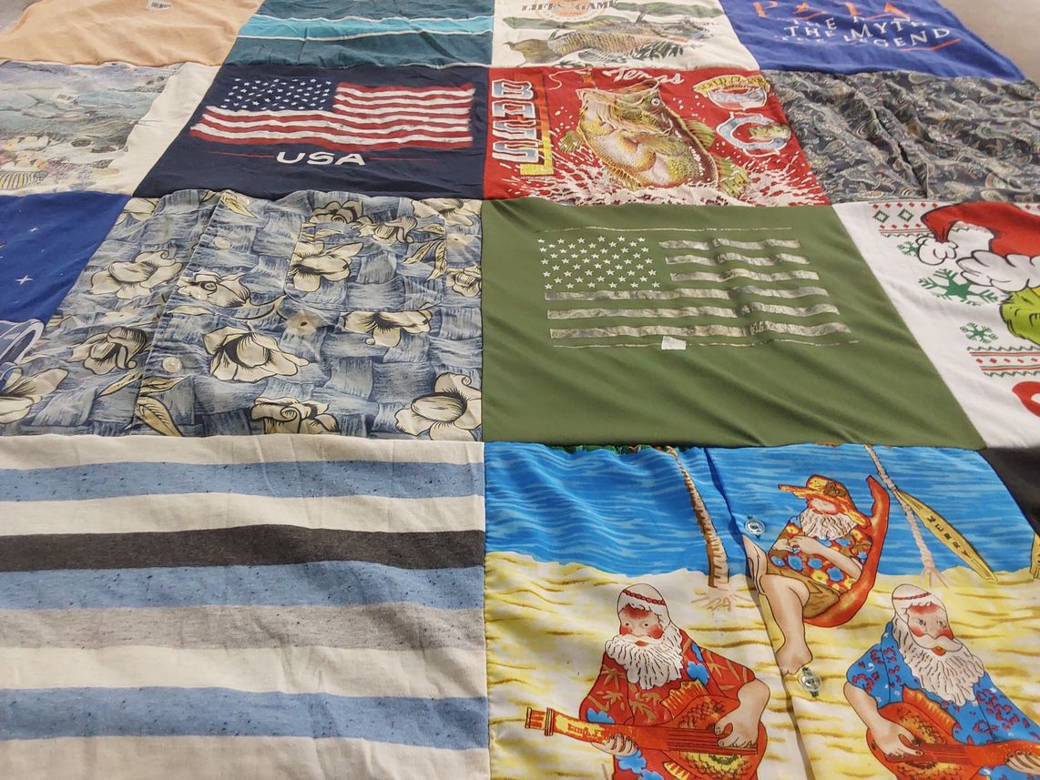T-shirt quilt with travel, holidays themes by Sheryl from NC