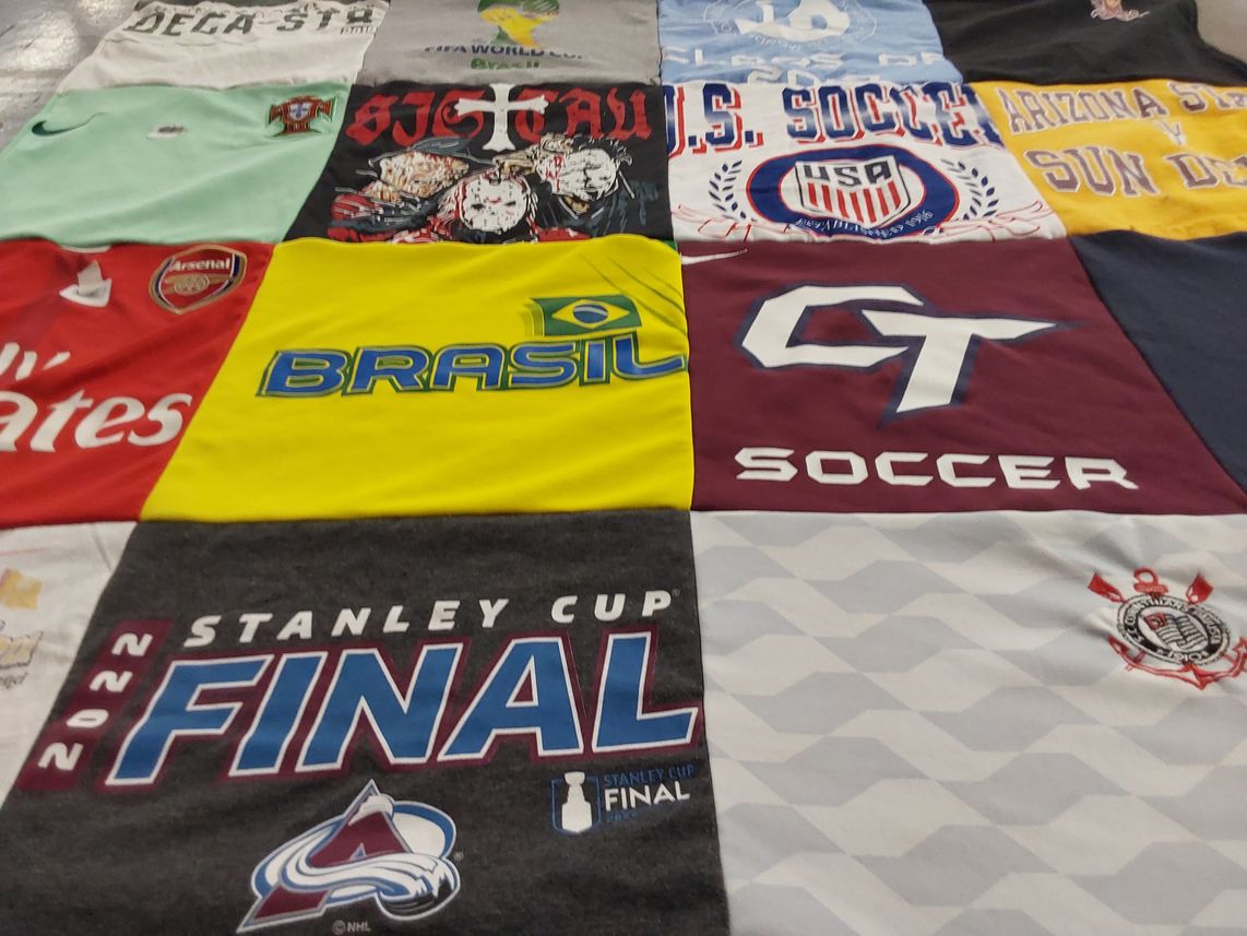 T-shirt quilt featuring colorado avalanche, brasil national soccer team by andrea from CO