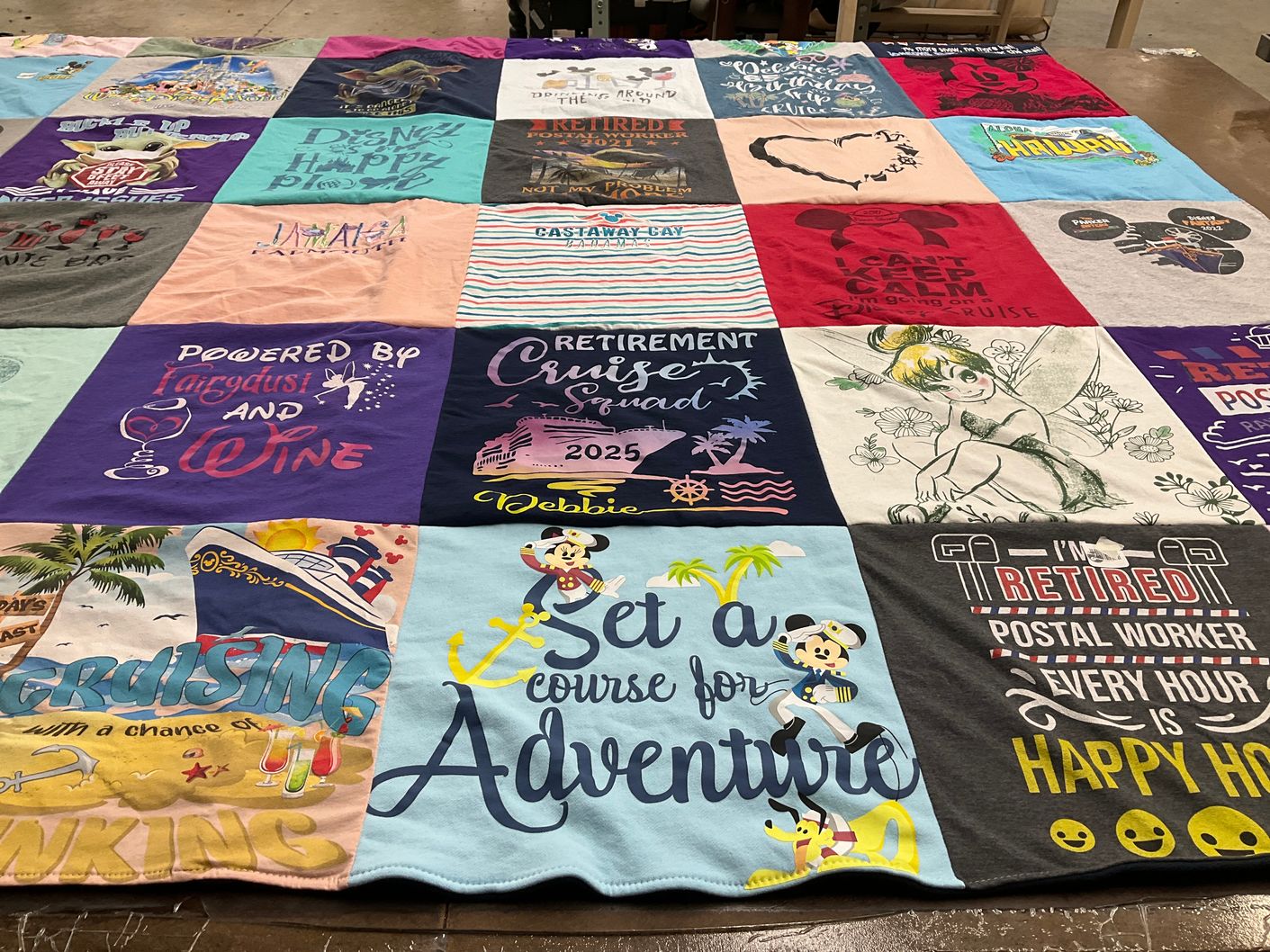 T-shirt quilt with disney, cruising themes by Debbie from OH