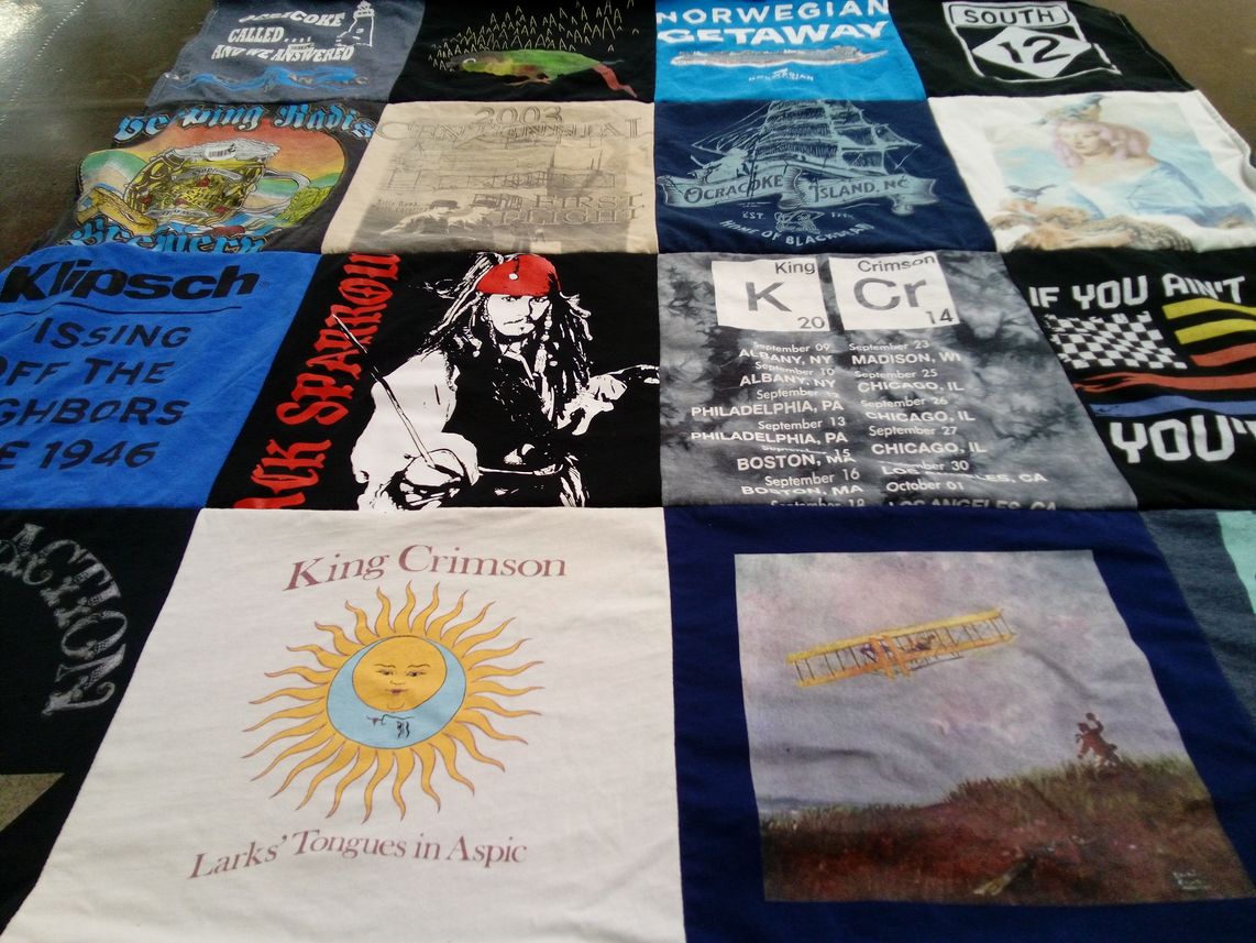 T-shirt quilt with music, travel themes by Regina from PA