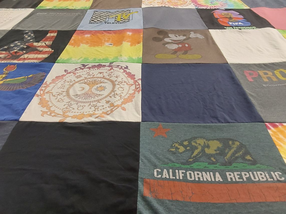 T-shirt quilt with music, television themes by Brian from CA