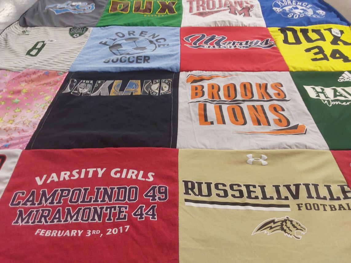 T-shirt quilt featuring brooks lions, florence soccer by Cissy from HI