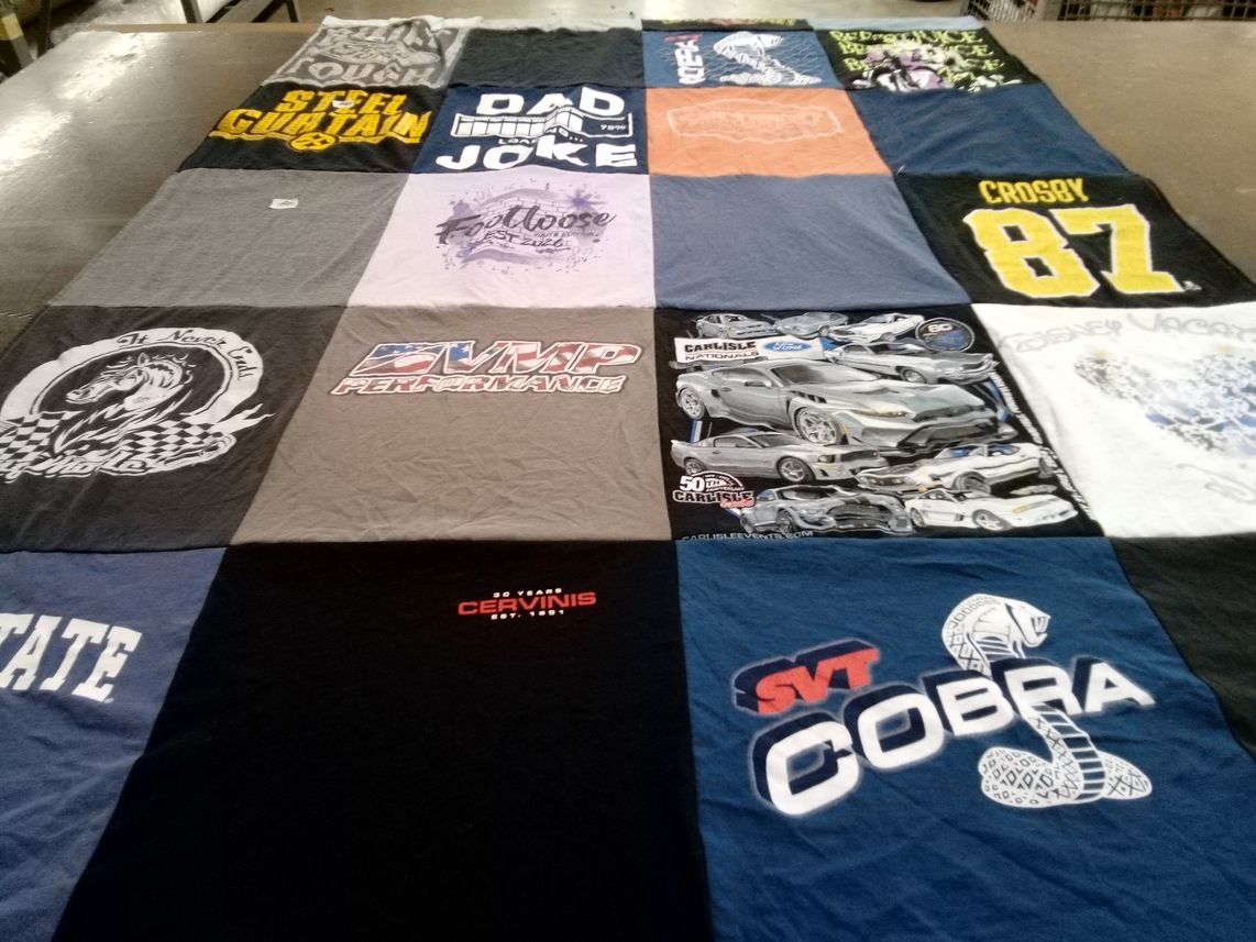 T-shirt quilt with automobiles, entertainment themes by Alison from PA