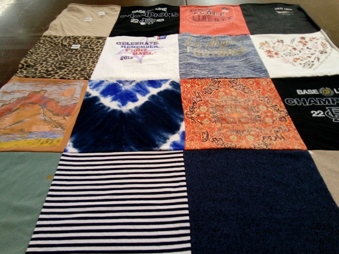 T-shirt quilt with sports, art themes by Suzy from CA