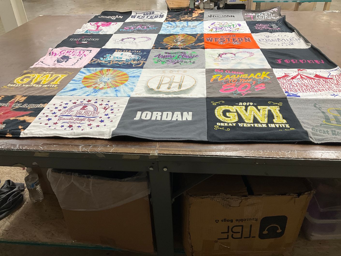 T-shirt quilt with fundraising, sports themes by Irene from IL