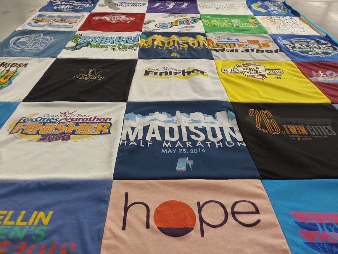 T-shirt quilt with running, marathons themes by Susan from WI