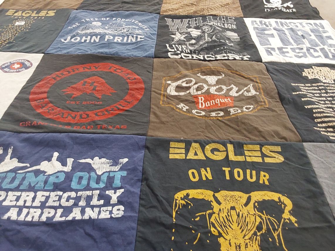 T-shirt quilt with music, fire safety themes by Lynn from TX