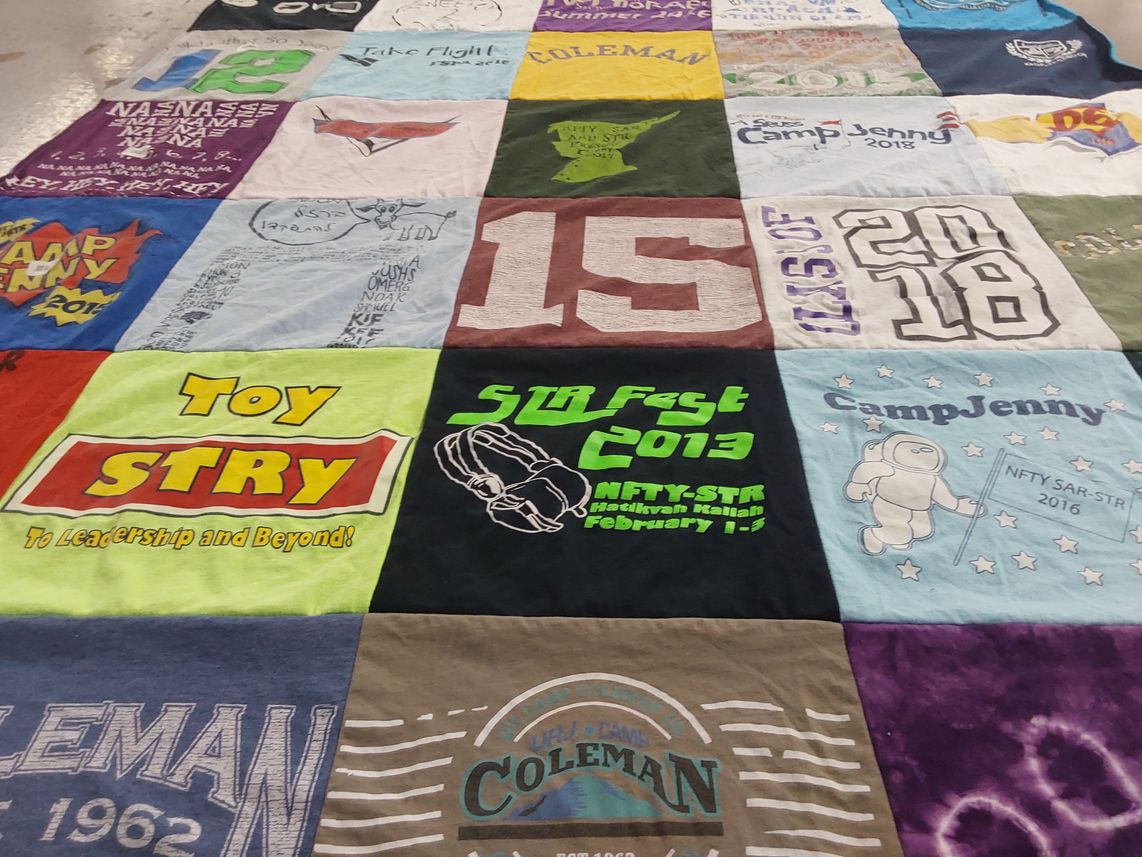 T-shirt quilt with leadership, camping themes by Naomi from FL