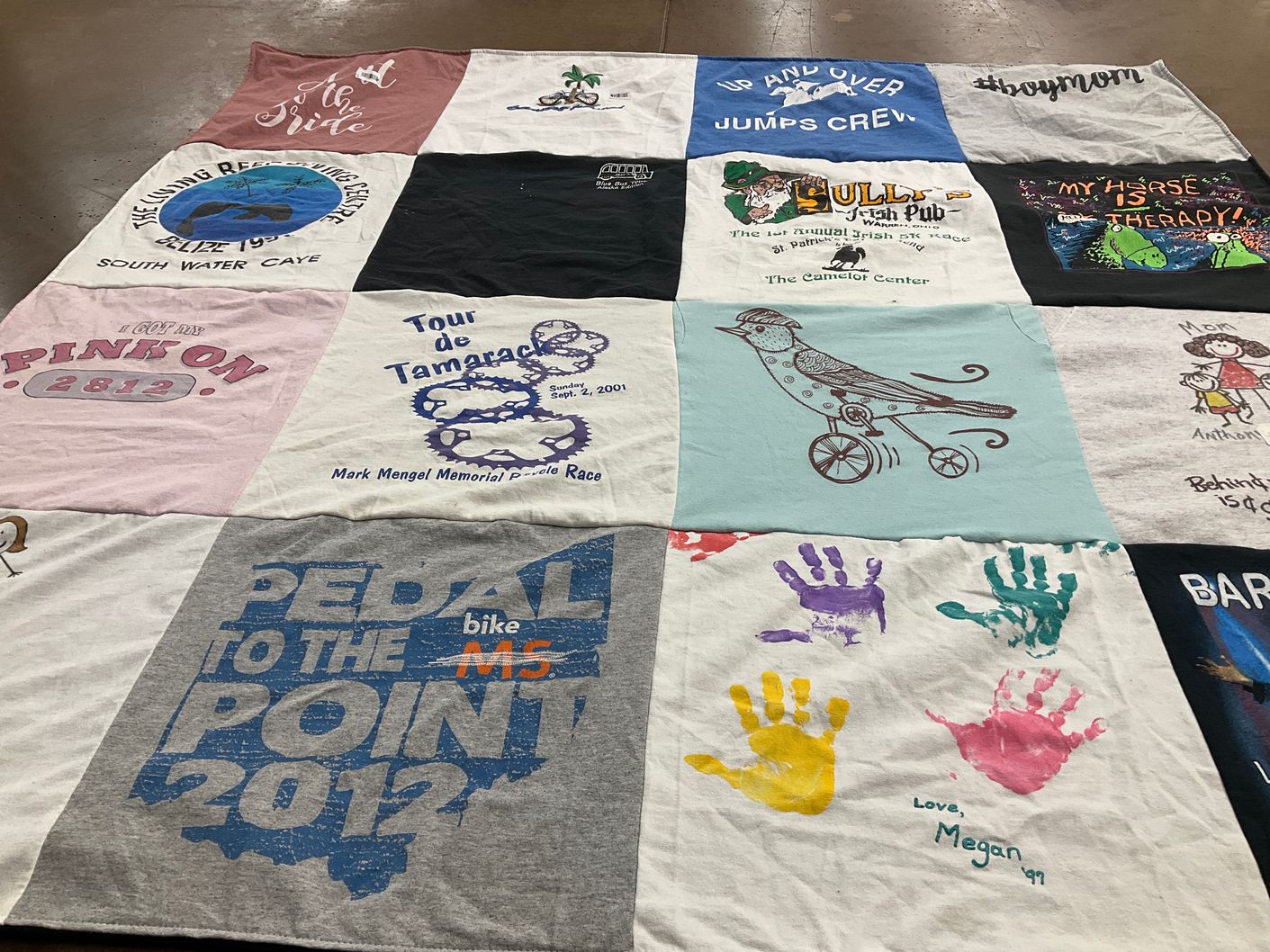 T-shirt quilt with cycling, fishing themes by Karen from OH