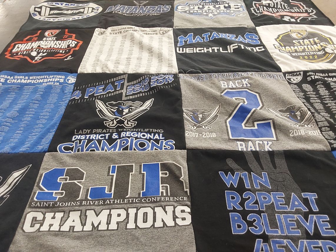 T-shirt quilt featuring matanzas weightlifting, lady pirates weightlifting by Monica from FL