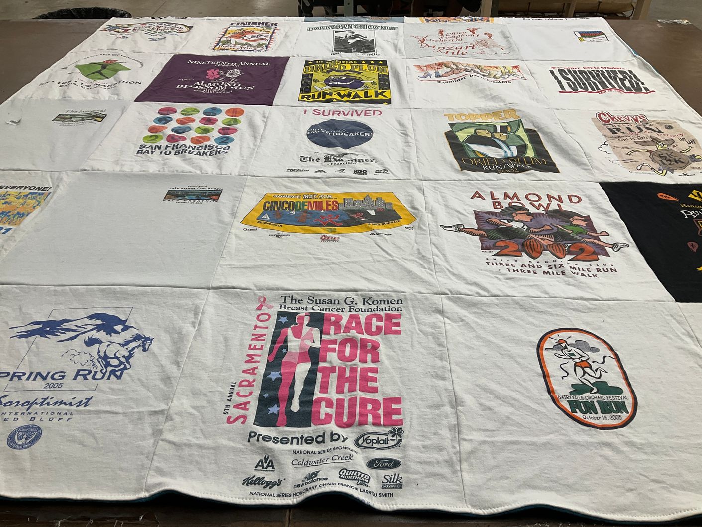 T-shirt quilt with running, charity themes by Debbie from CA