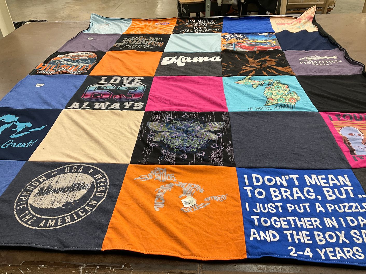 T-shirt quilt with travel, outdoor activities themes by Carol from MI