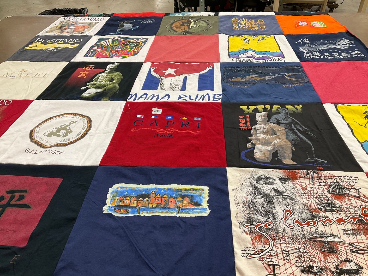 T-shirt quilt with travel, art themes by Ilean from FL