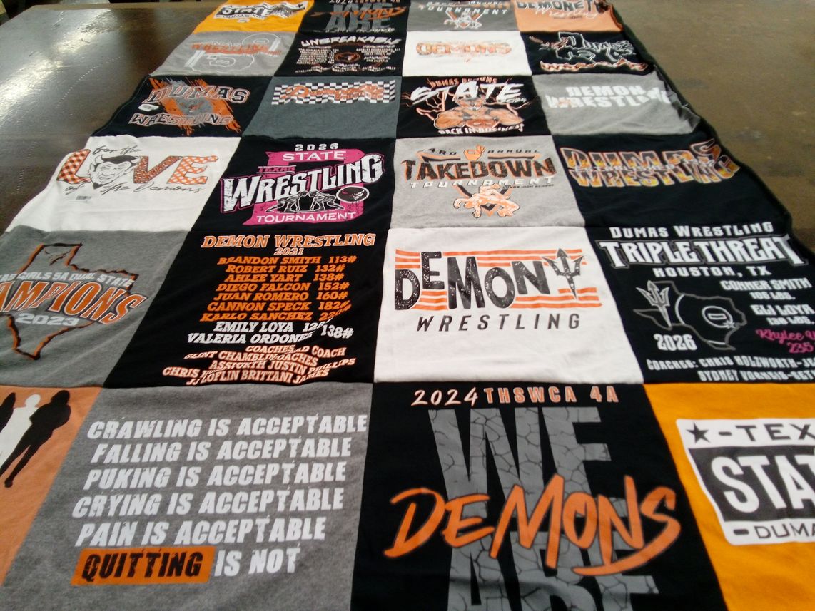T-shirt quilt featuring dumas wrestling by kristen from TX