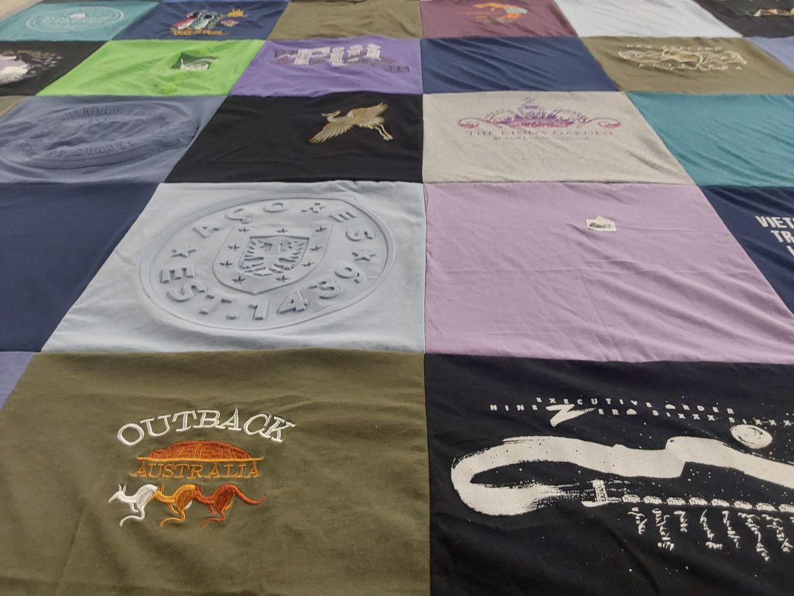 T-shirt quilt with travel, australian culture themes by Jolyn from AZ