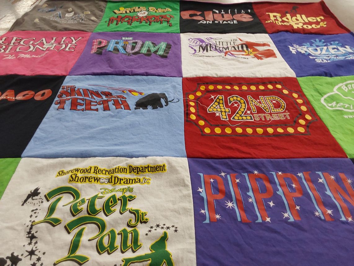 T-shirt quilt with theater, musicals themes by Paru from WI